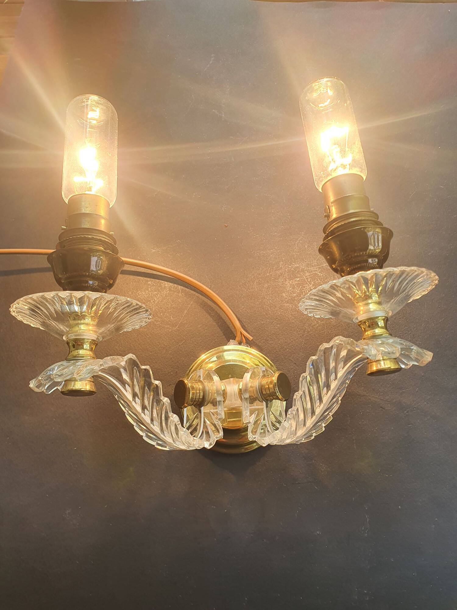 Wall lamp with palm leaf candle holders from the 1950s.
