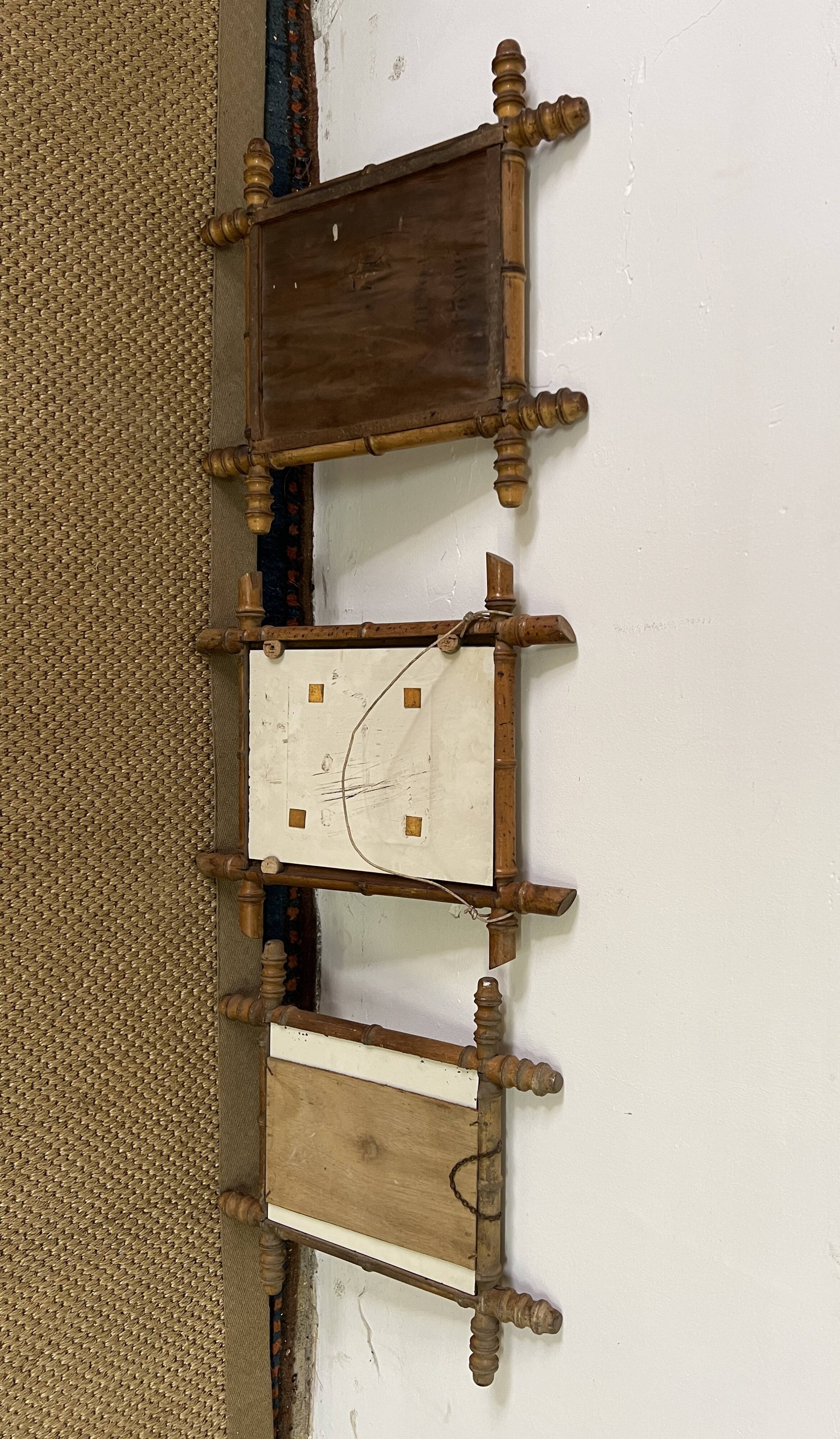 Suite of three antique mirrors in bamboo and rattan