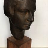 Bronze young woman's head