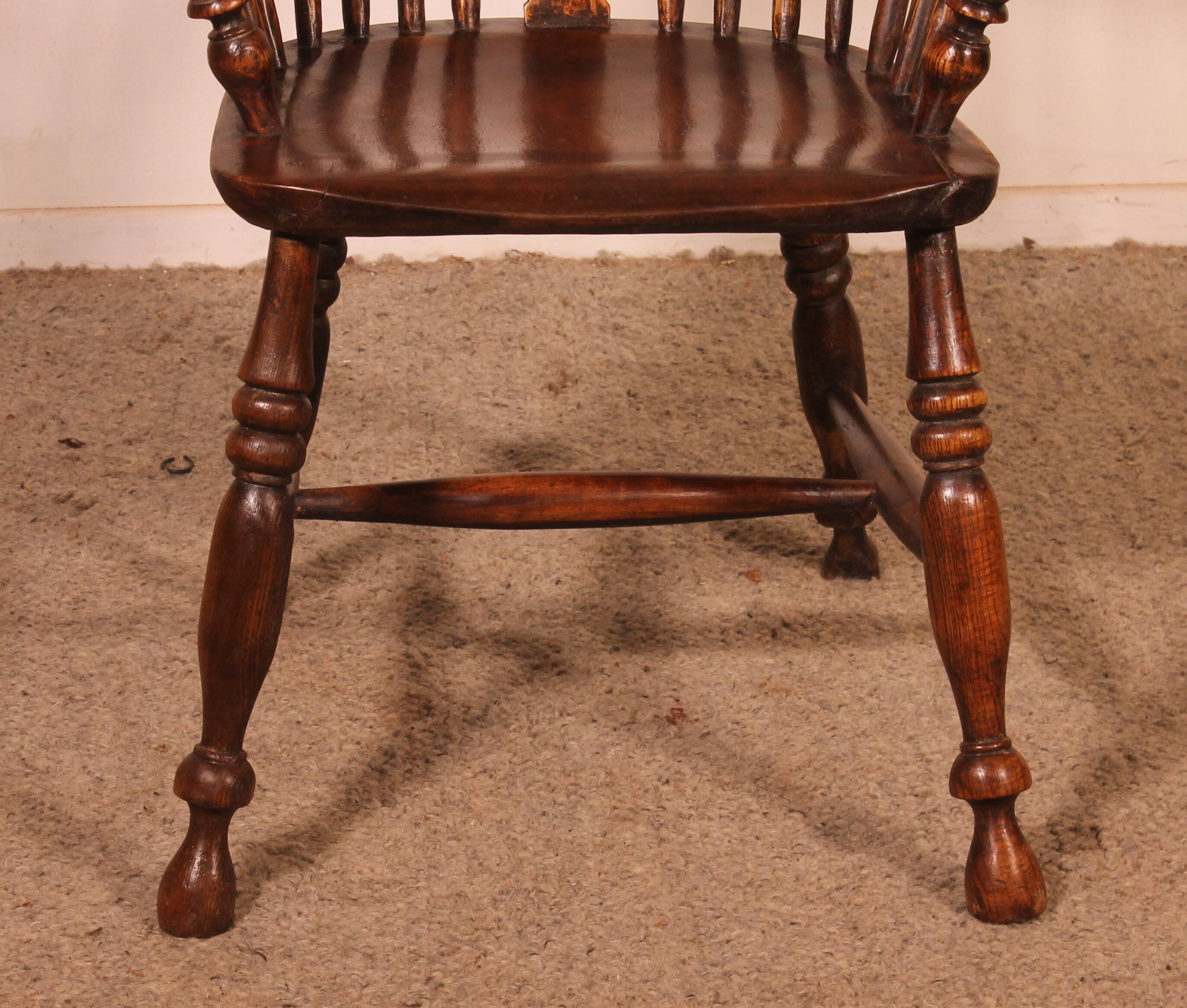 Windsor armchair in ash and elm from the early 19th century
