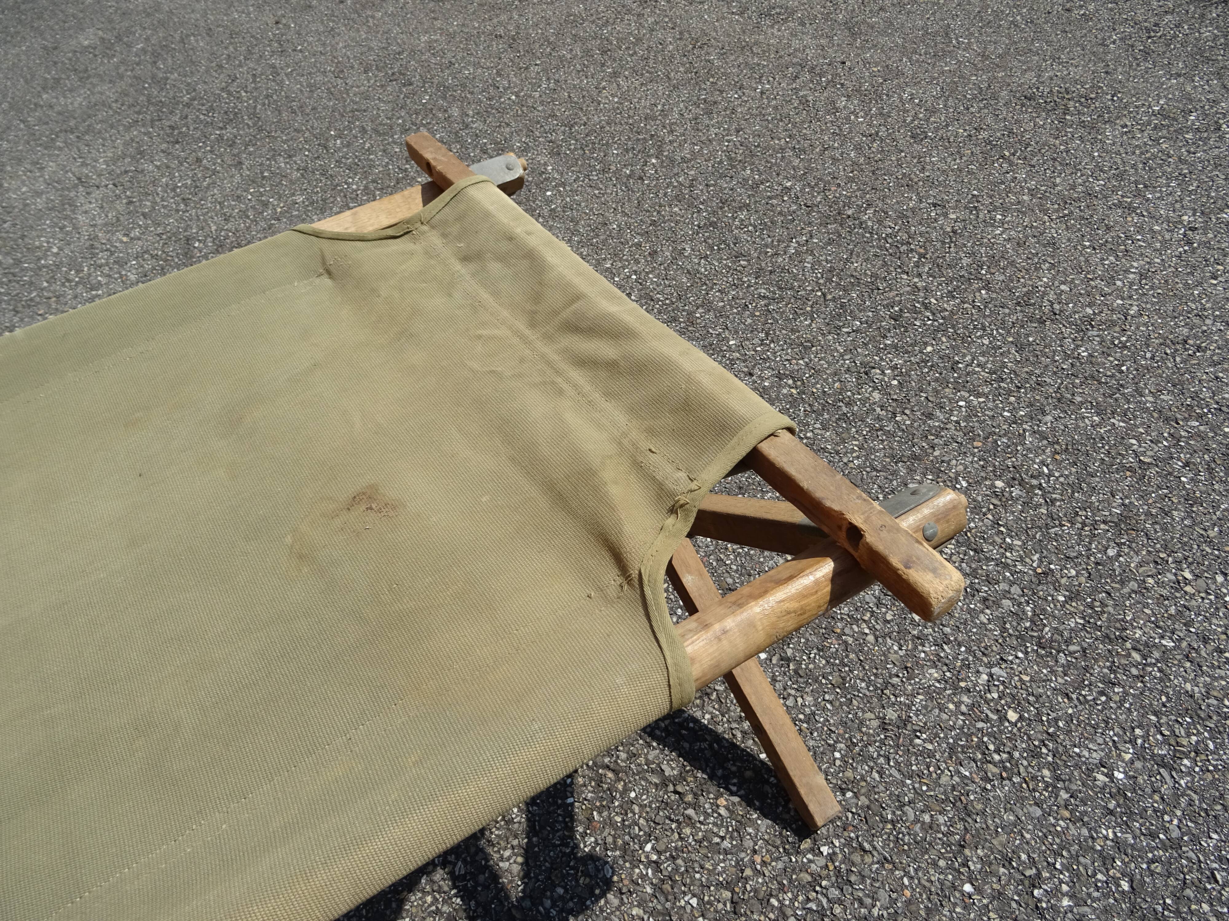 Khaki military camp bed