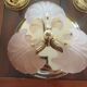 Rare set of wall sconces and shell ceiling light.