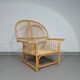 Oversized rattan / bamboo lounge chair with original cushions. 1970s