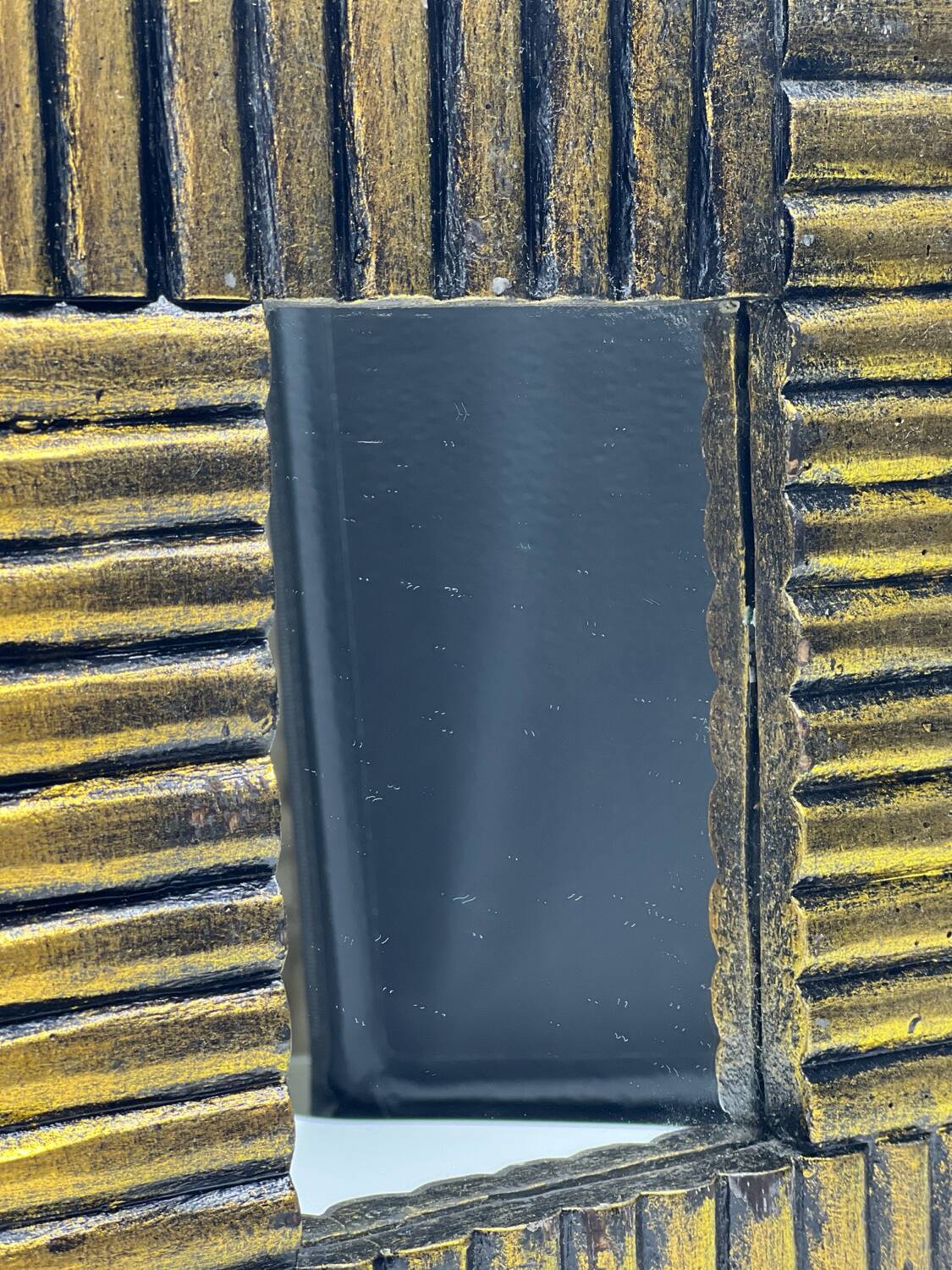 Art deco mirror in gilded wood