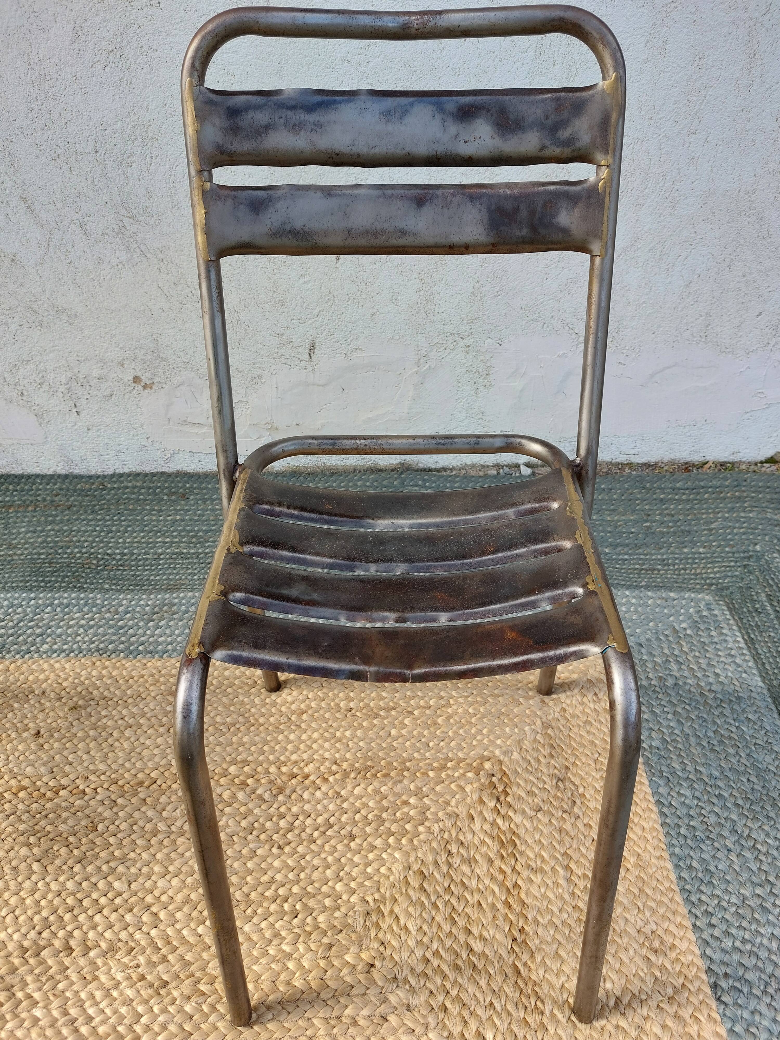 3 metal chairs, Tolix style