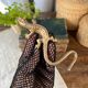 Small brass lizard
