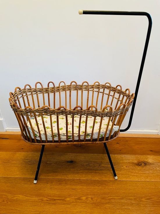Vintage rattan doll cradle