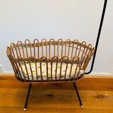 Vintage rattan doll cradle