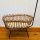 Vintage rattan doll cradle