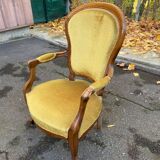 Louis Philippe armchair in oak and mustard yellow velvet from the 19th century