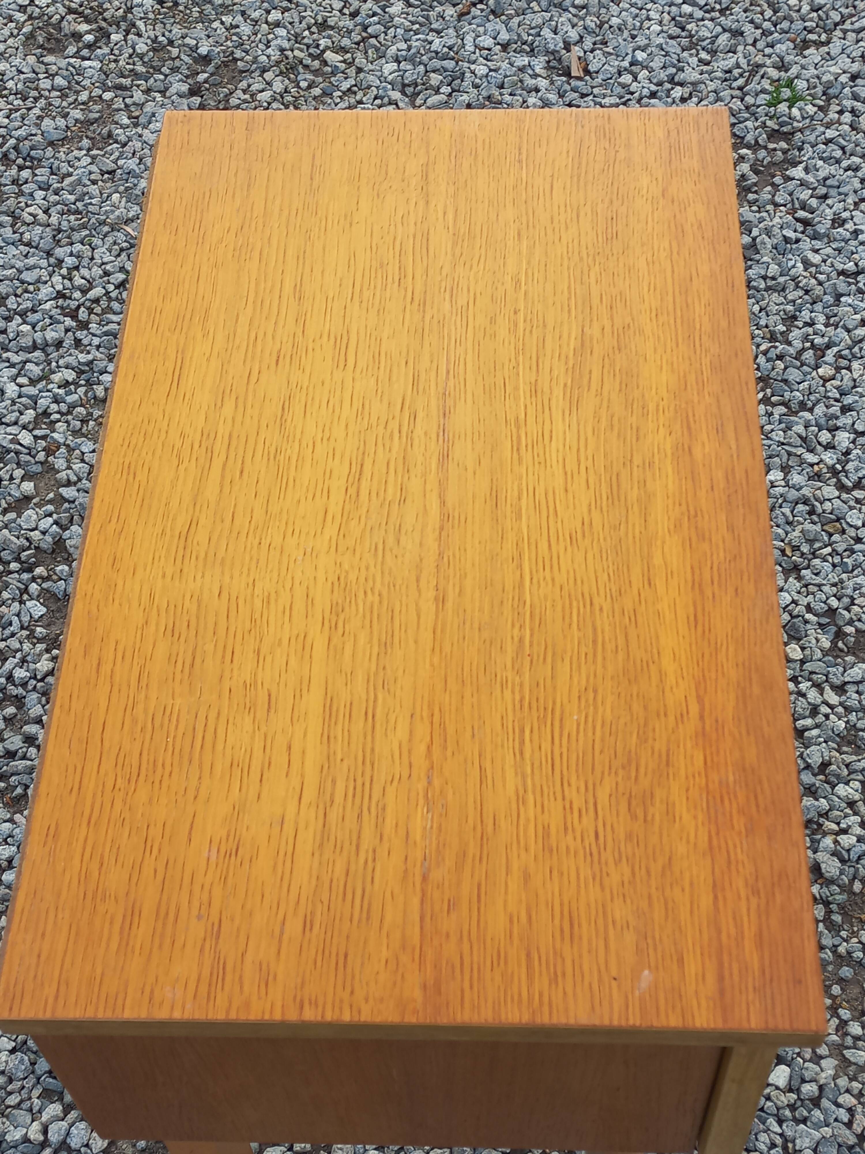 Vintage 1950s bedside table in blond oak with conical legs