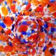 Small antique art deco cobalt orange speckled glass paste vase