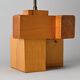 Sculptural table lamp in solid pine, France, circa 1970.