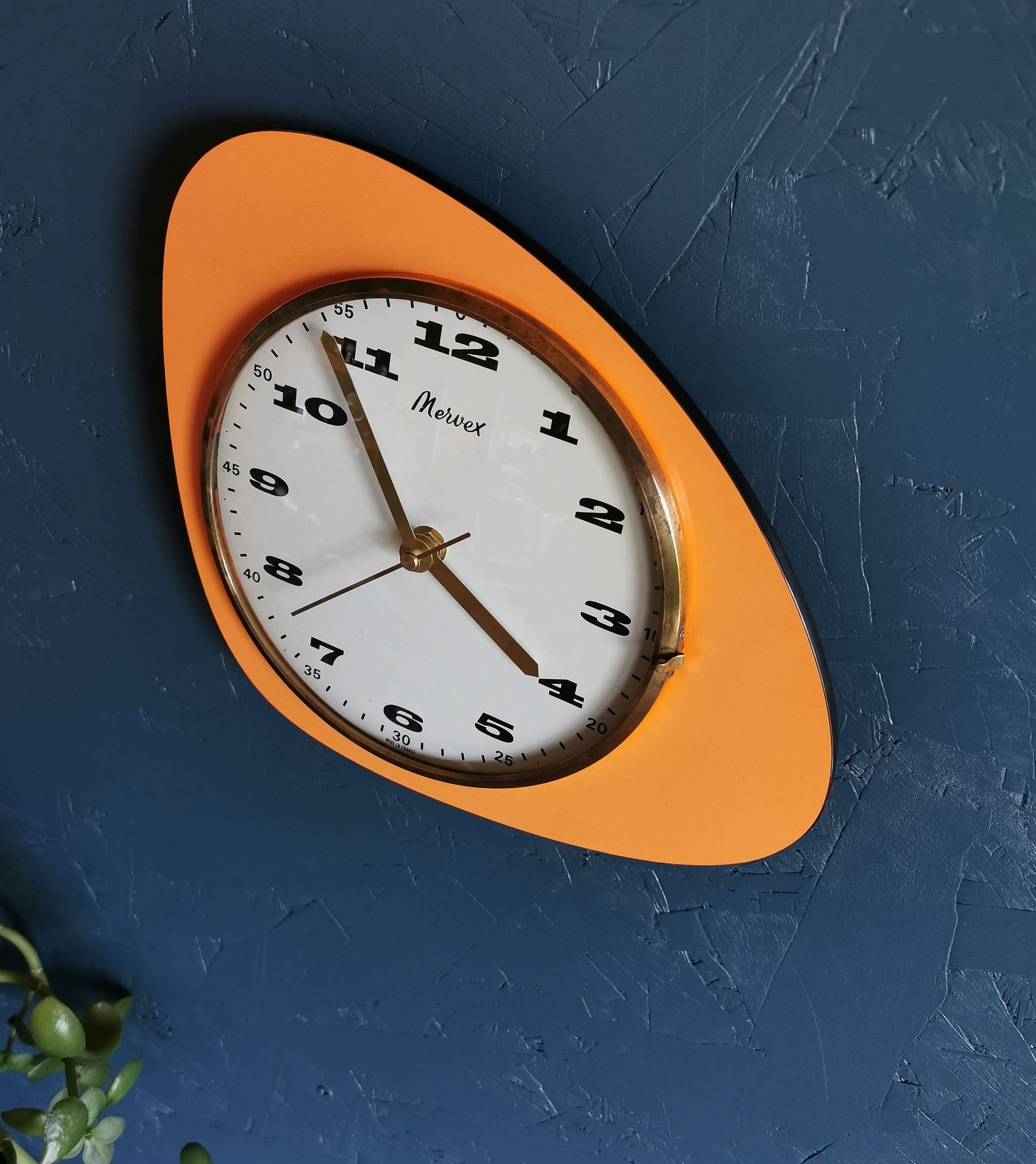 Vintage formica clock asymmetrical silent wall clock "Mervex orange"
