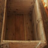 Wooden case with letters in black inck