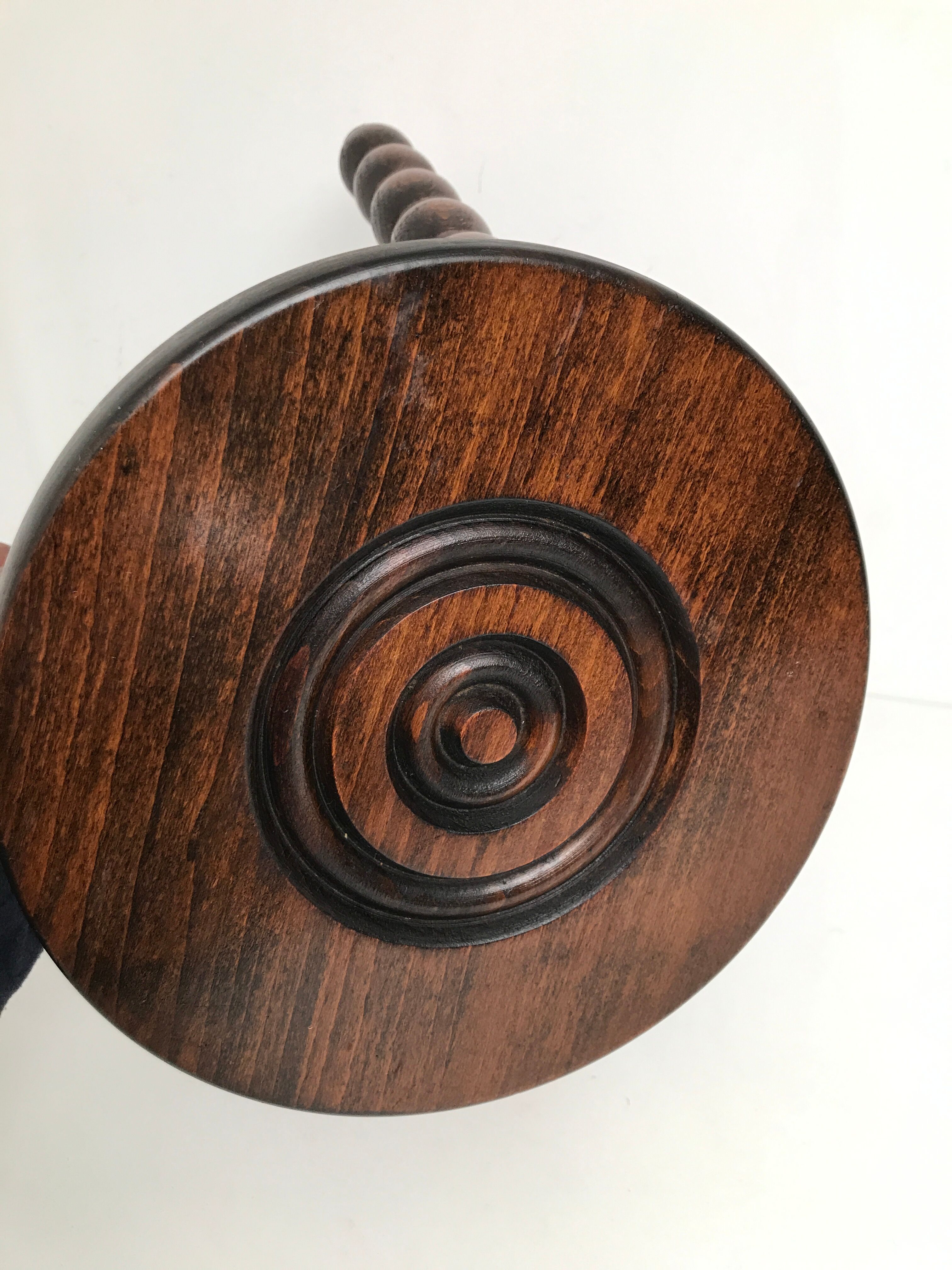 Wooden stool turned tripod foot