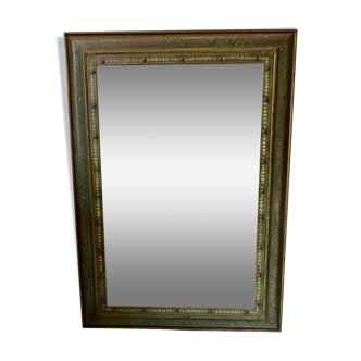 Mirror with polychrome metal frame