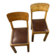 Pair of wooden and leather chairs