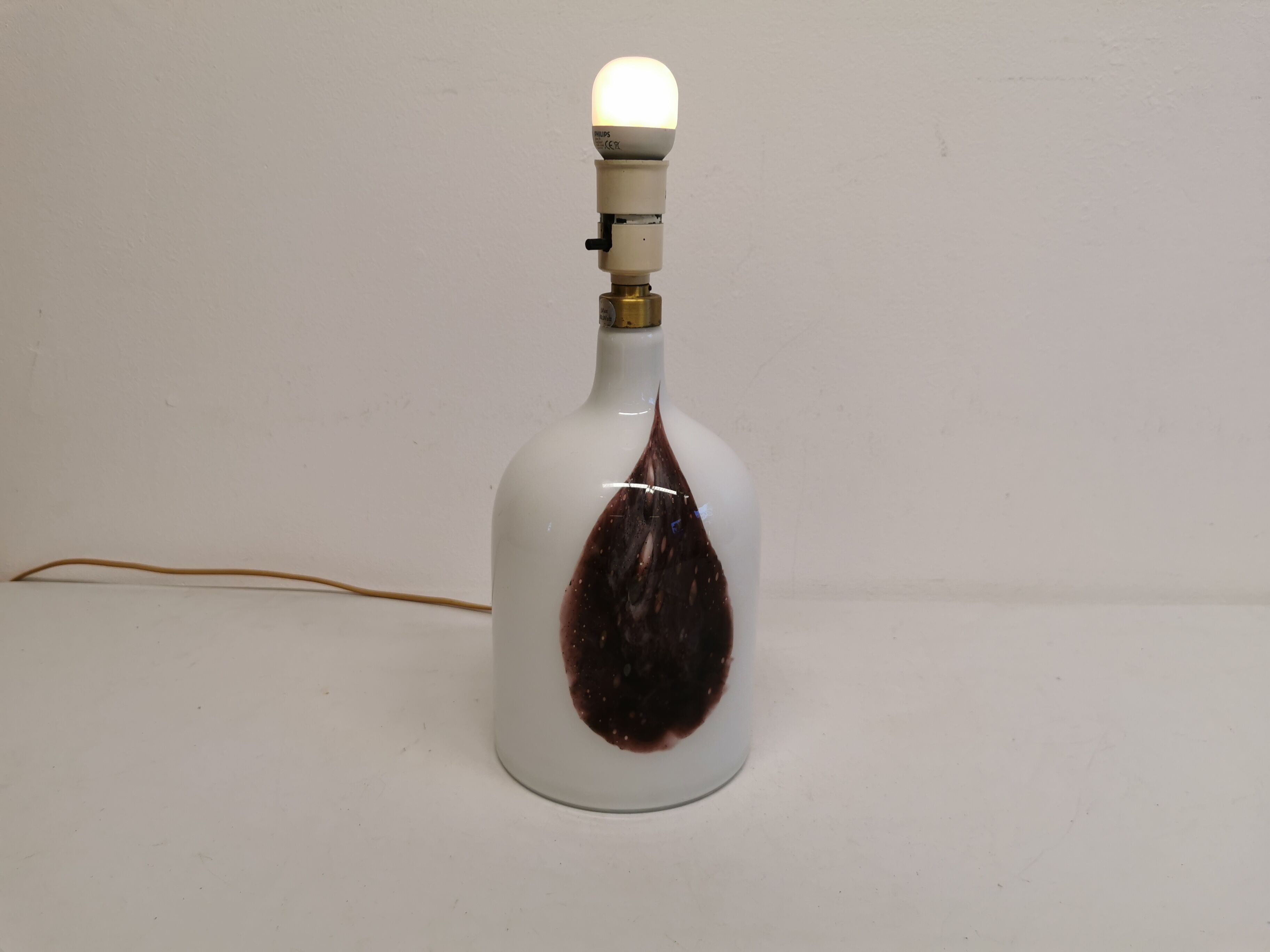 Older table lamp in milky white opaline glass with purple pattern / details from danish holmegaard.