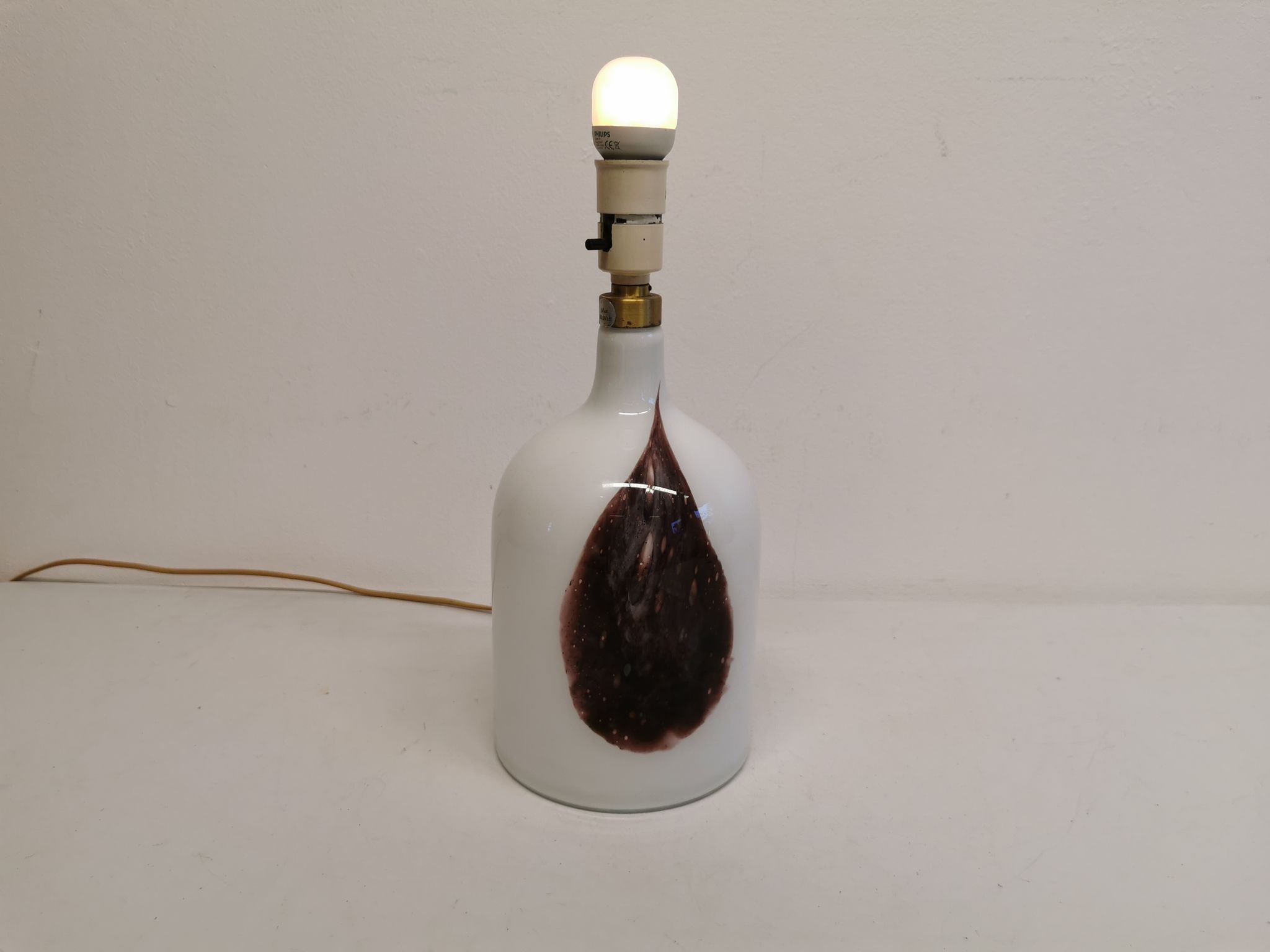 Older table lamp in milky white opaline glass with purple pattern / details from danish holmegaard.