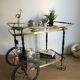 Vintage rolling golden and black dessert in brass and glass
