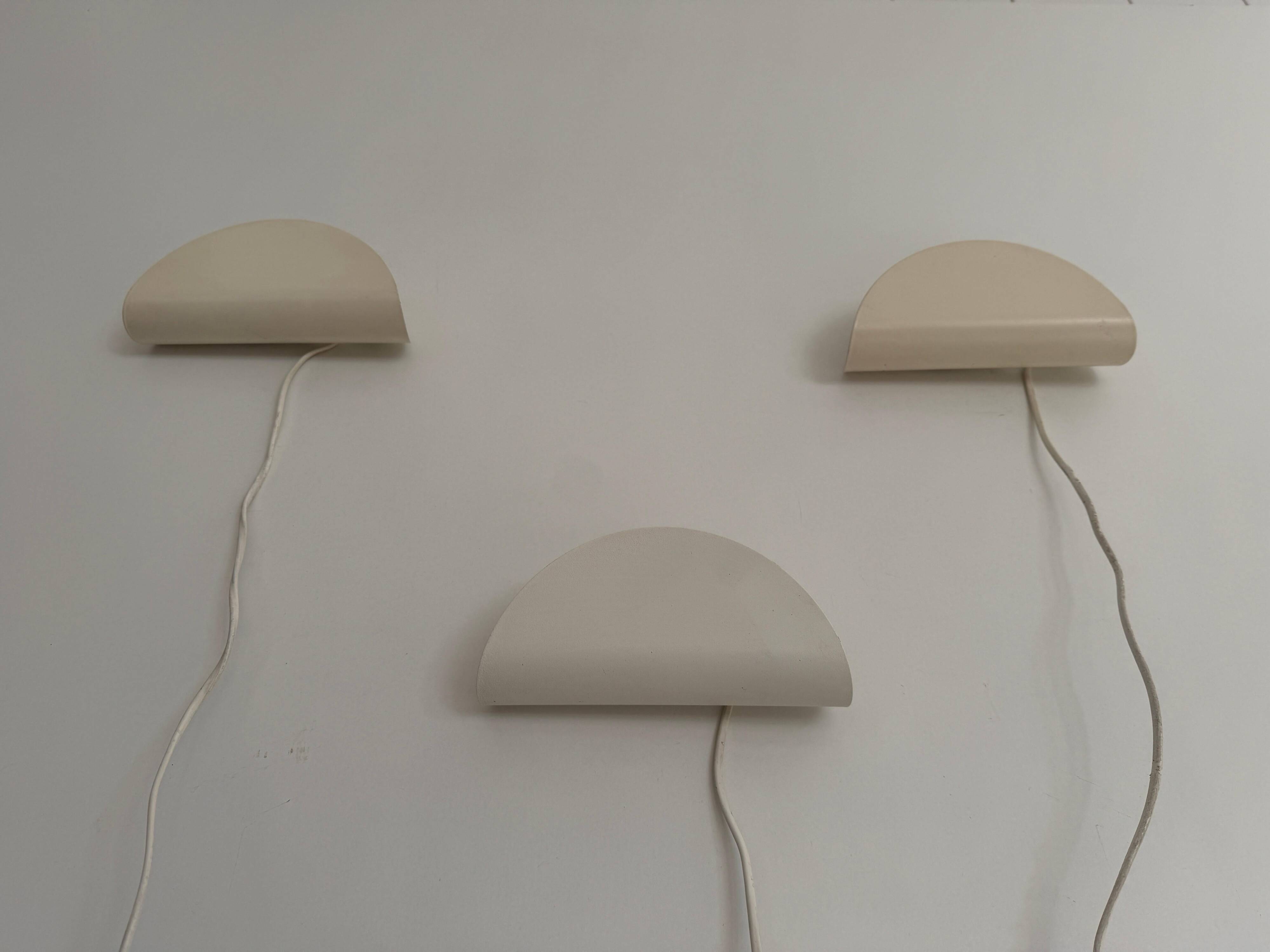 Set of three cream metal wall lights by Nordlux, 1980s, Sweden.
