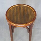 low bistro stool in curved wood laminated seat, circa 1920