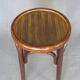 low bistro stool in curved wood laminated seat, circa 1920
