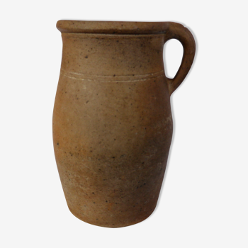 Old stoneware milk jug