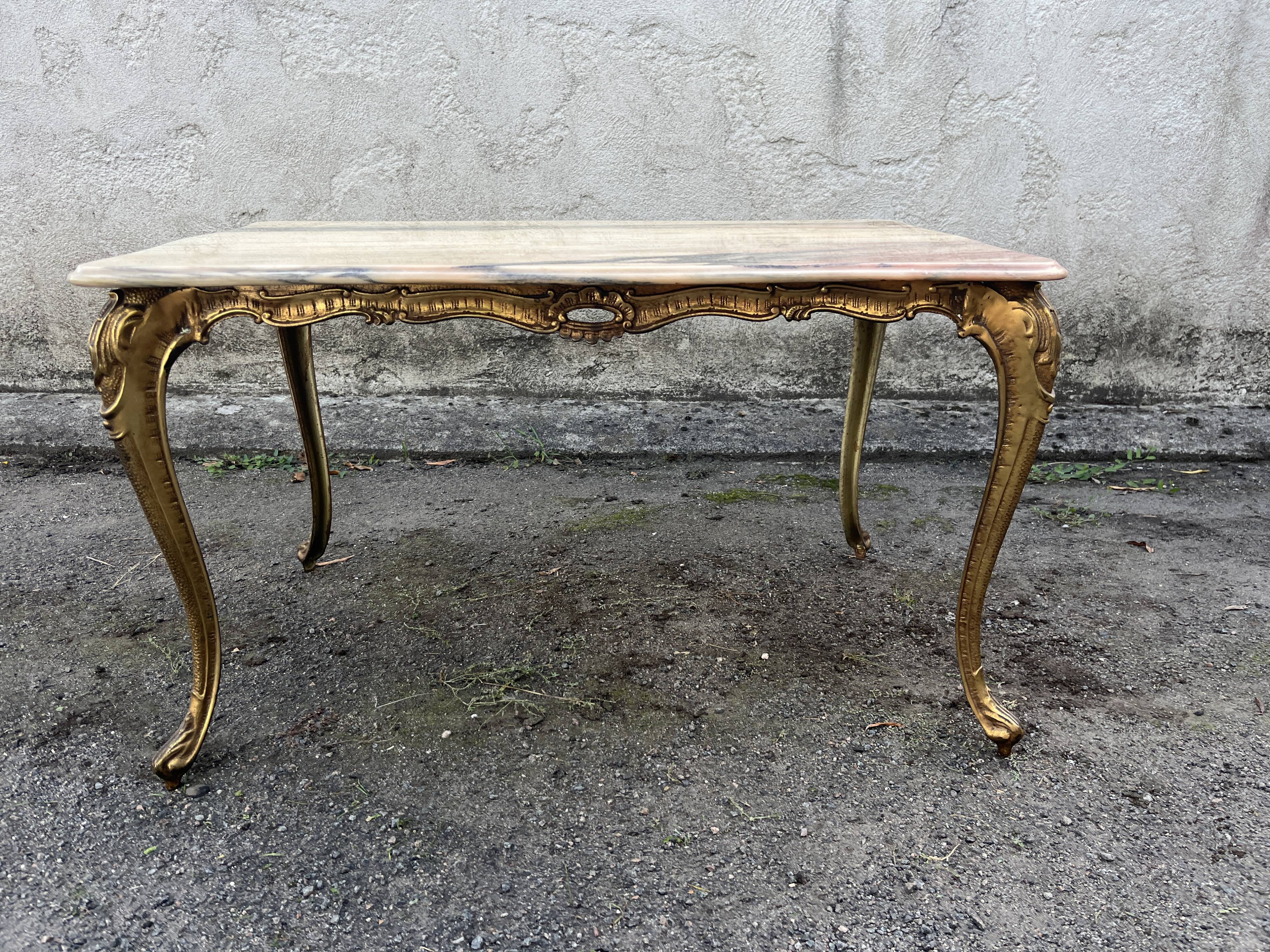 Gilded brass coffee table with onyx top
