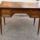 Louis XVI desk in solid wood and leather from the 20th century.