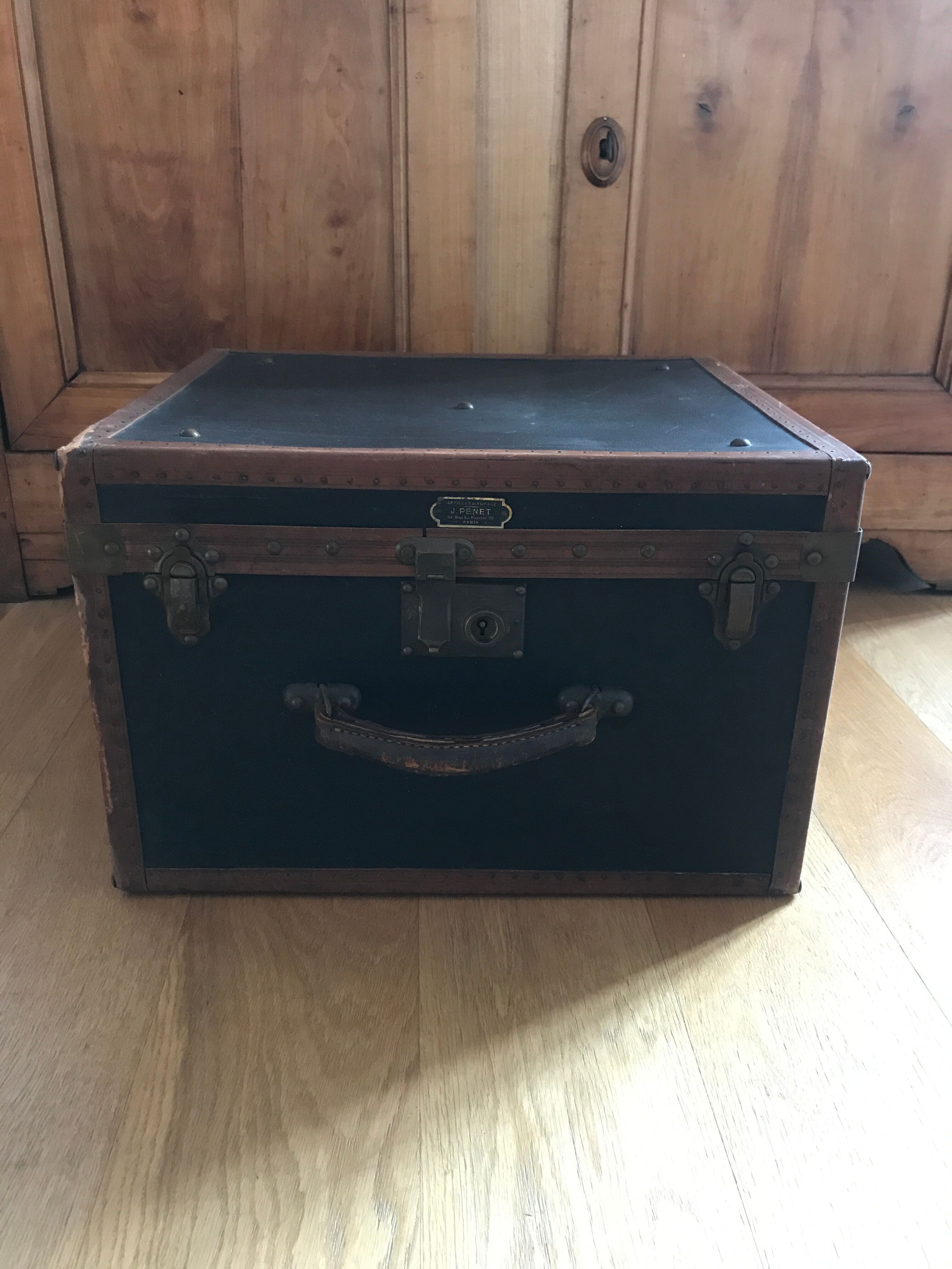 Old square travel trunk J Penet