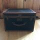 Old square travel trunk J Penet