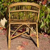 Pair of 1950s rattan armchairs from France.
