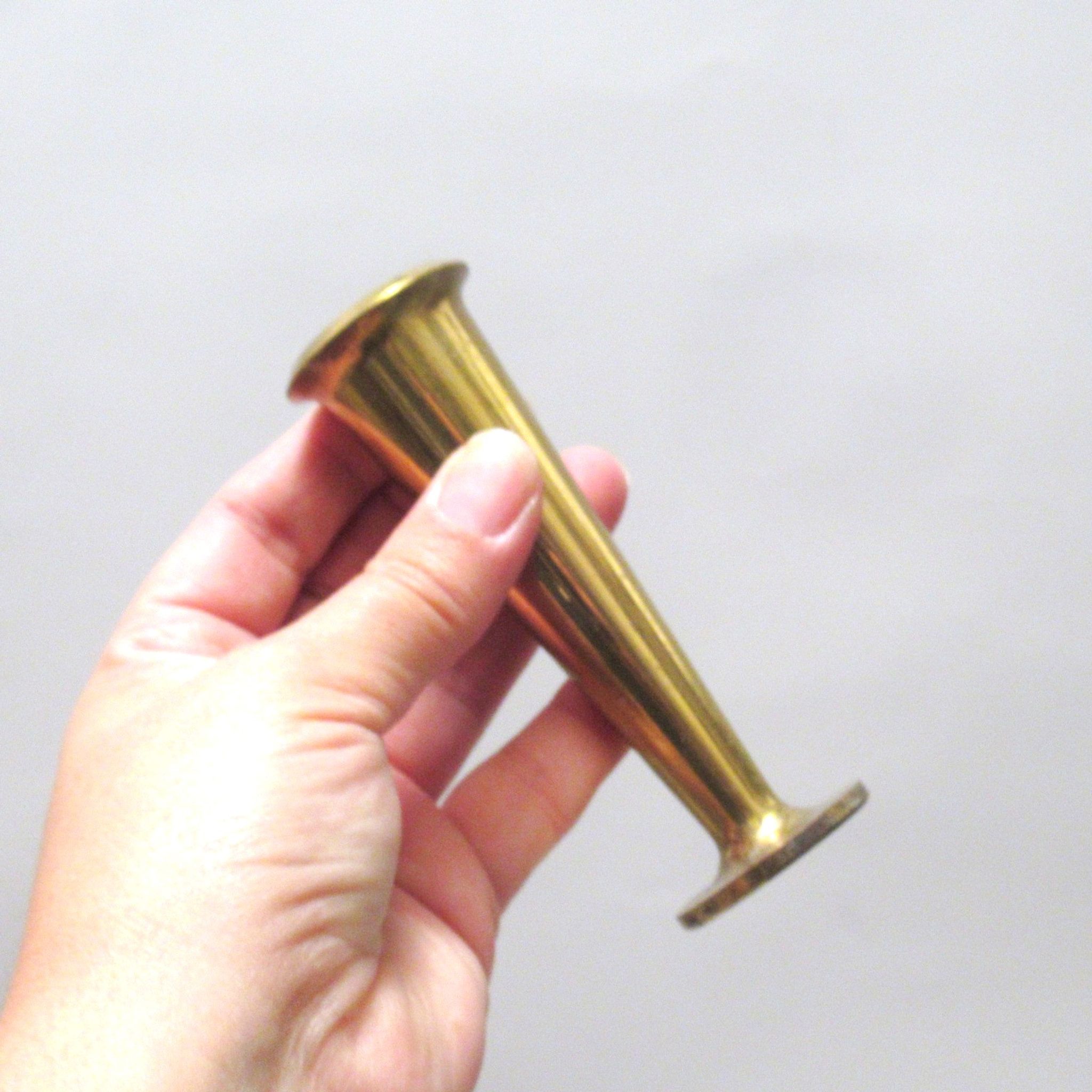 Five scandinavian brass candle holders 60s