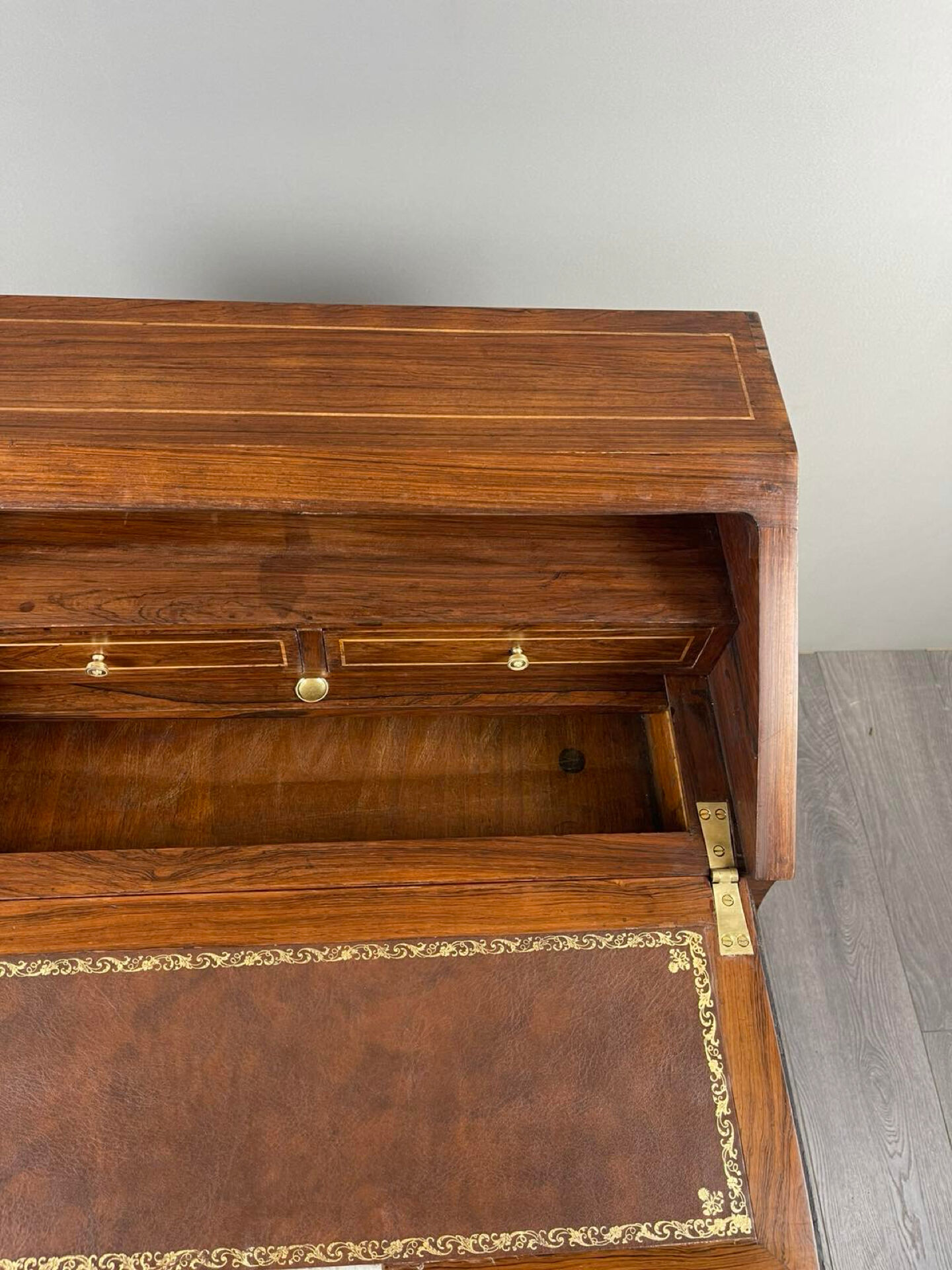 Secretary with a drop-down front in marquetry, Louis XV style, 19th century.