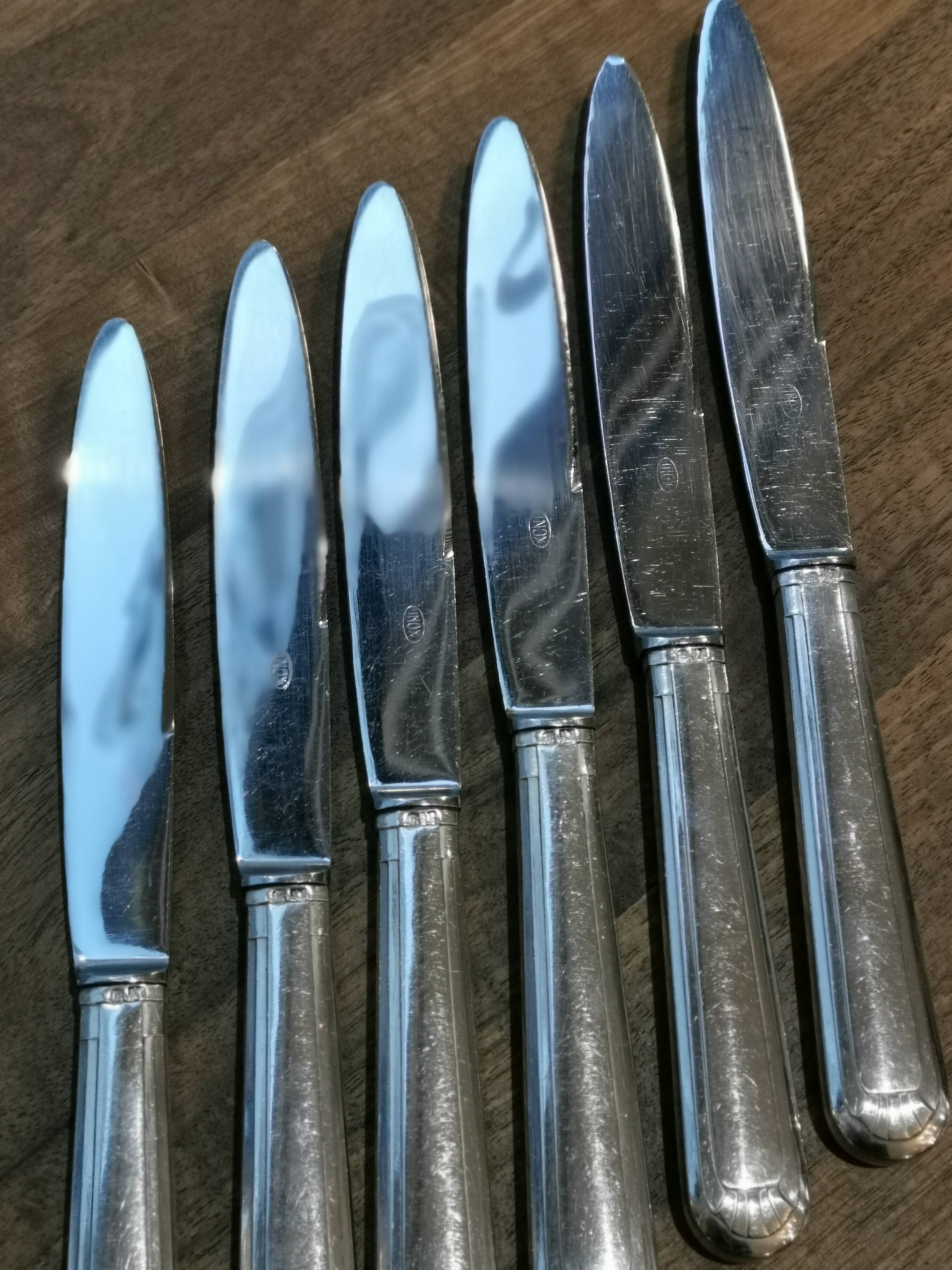 6 large silver metal knives