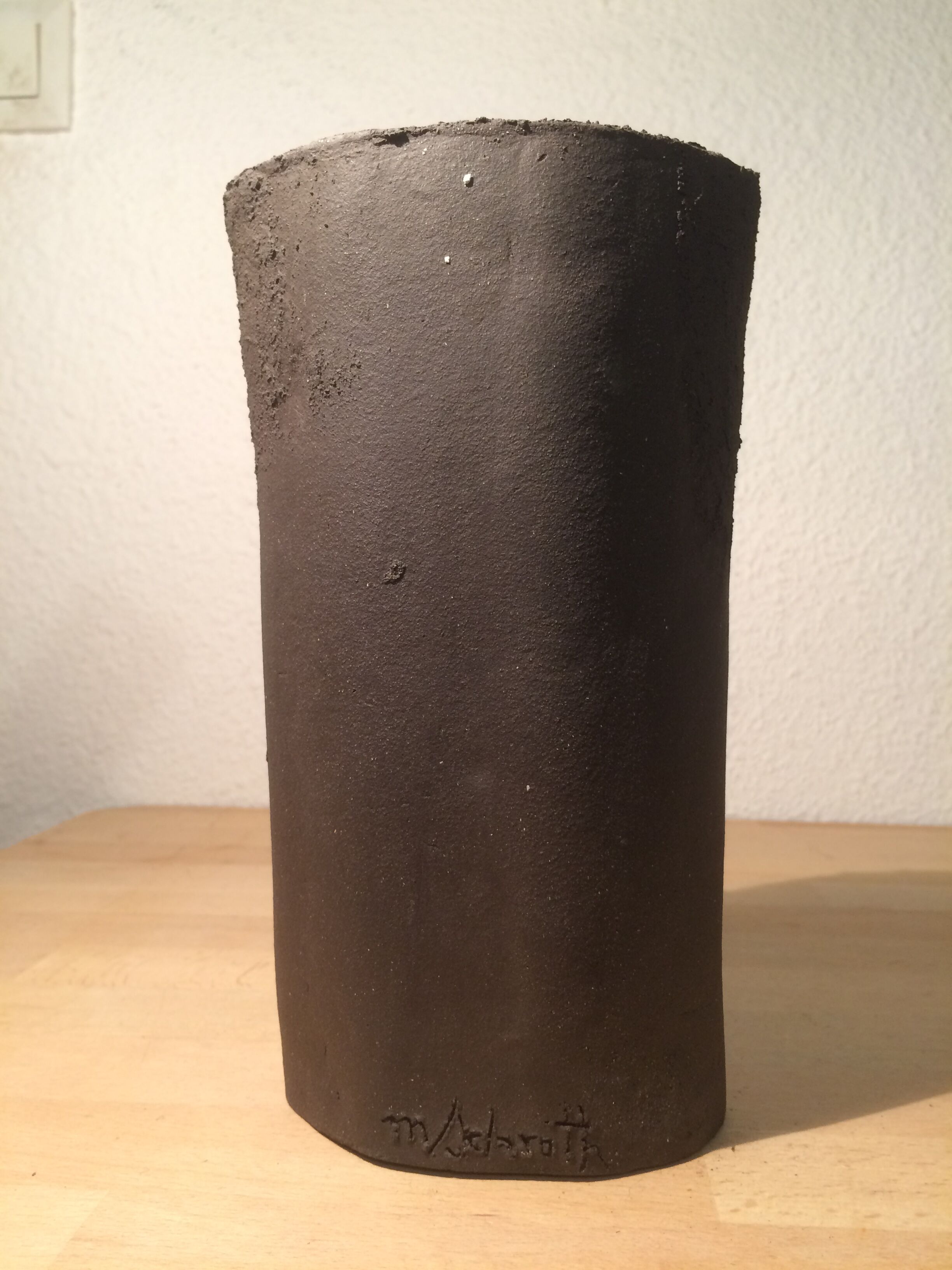 Ceramic vase face, black and white