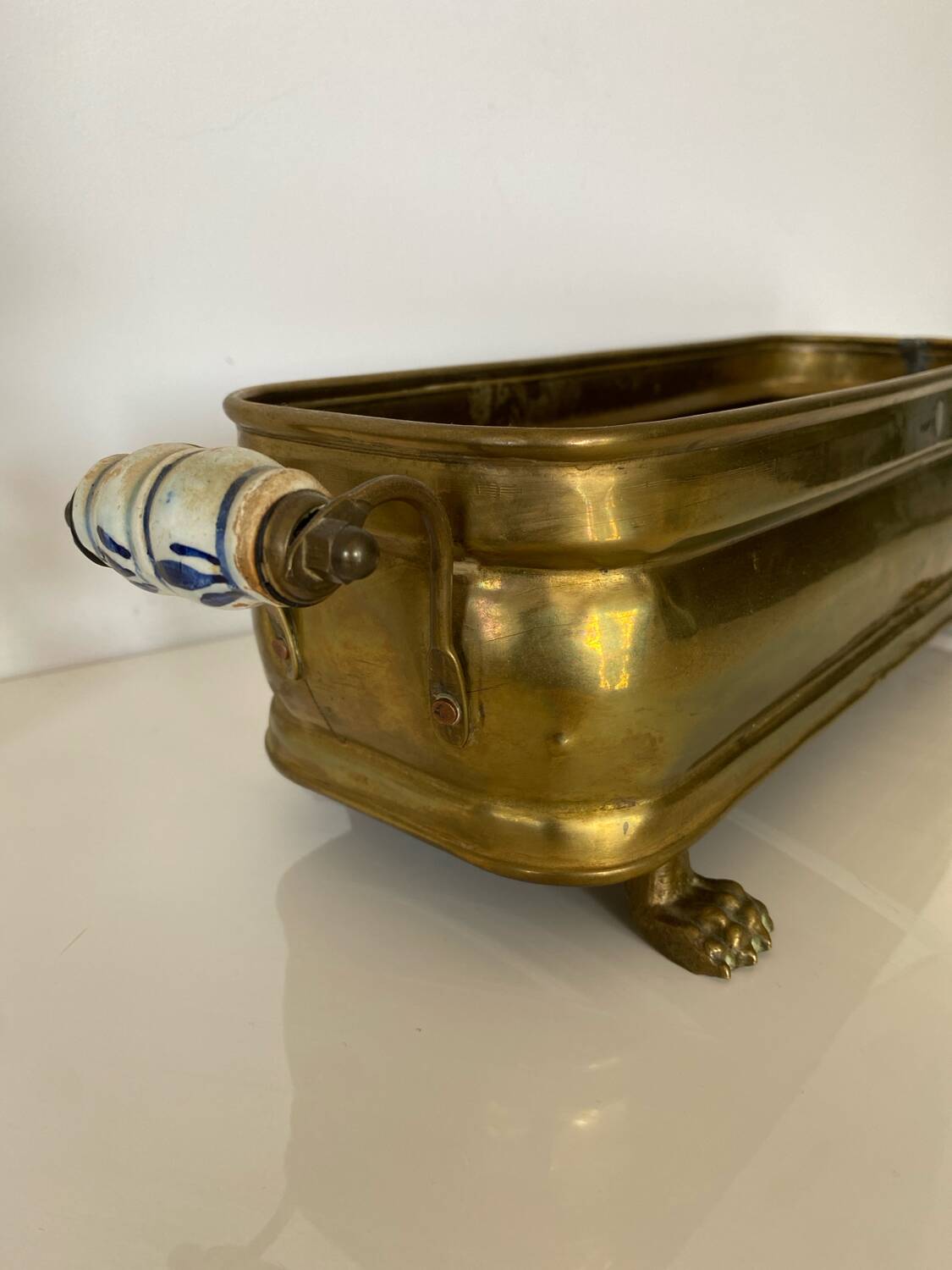 Antique brass planter with porcelain handles