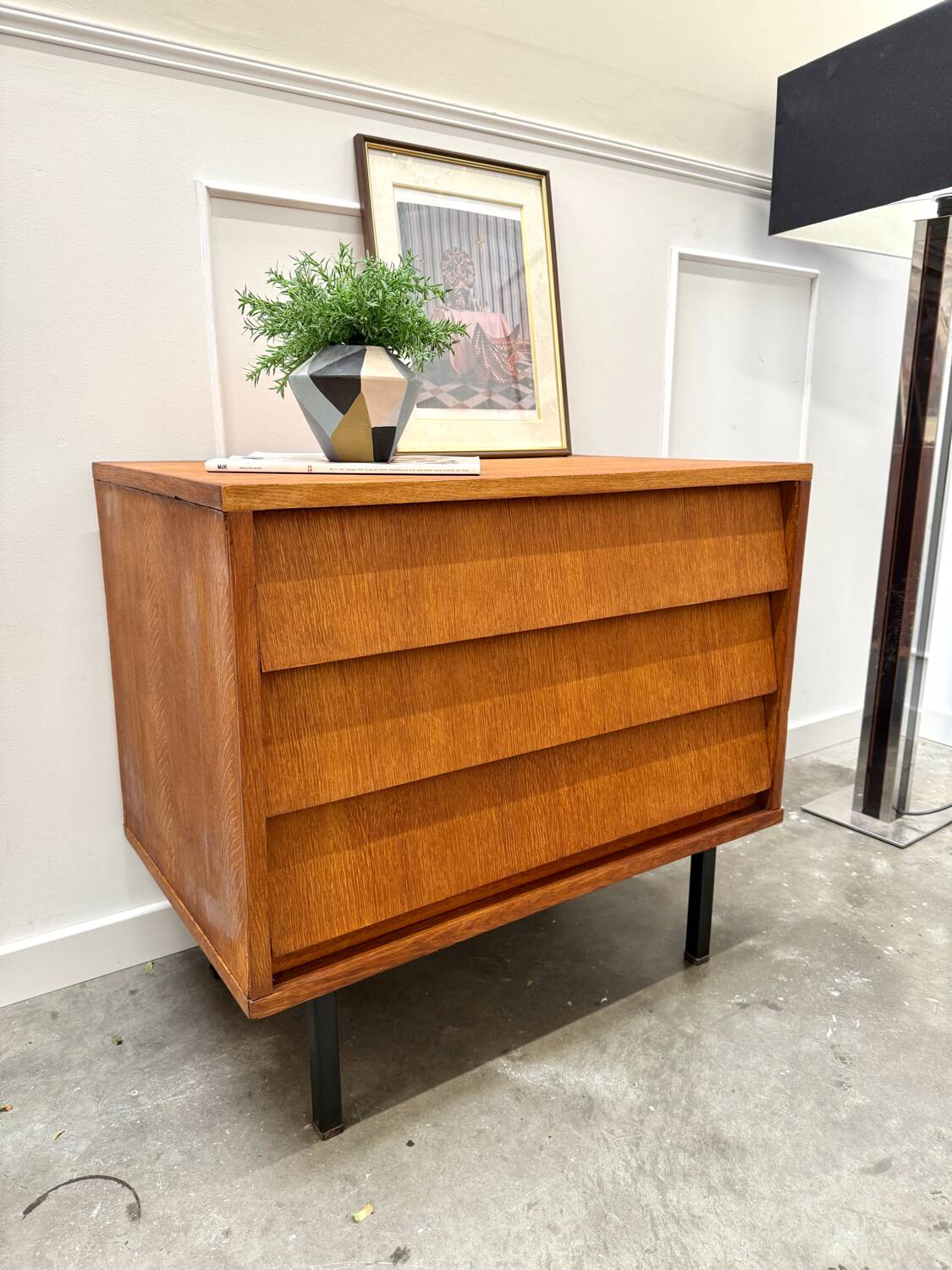 Modernist chest of drawers with slanted drawers