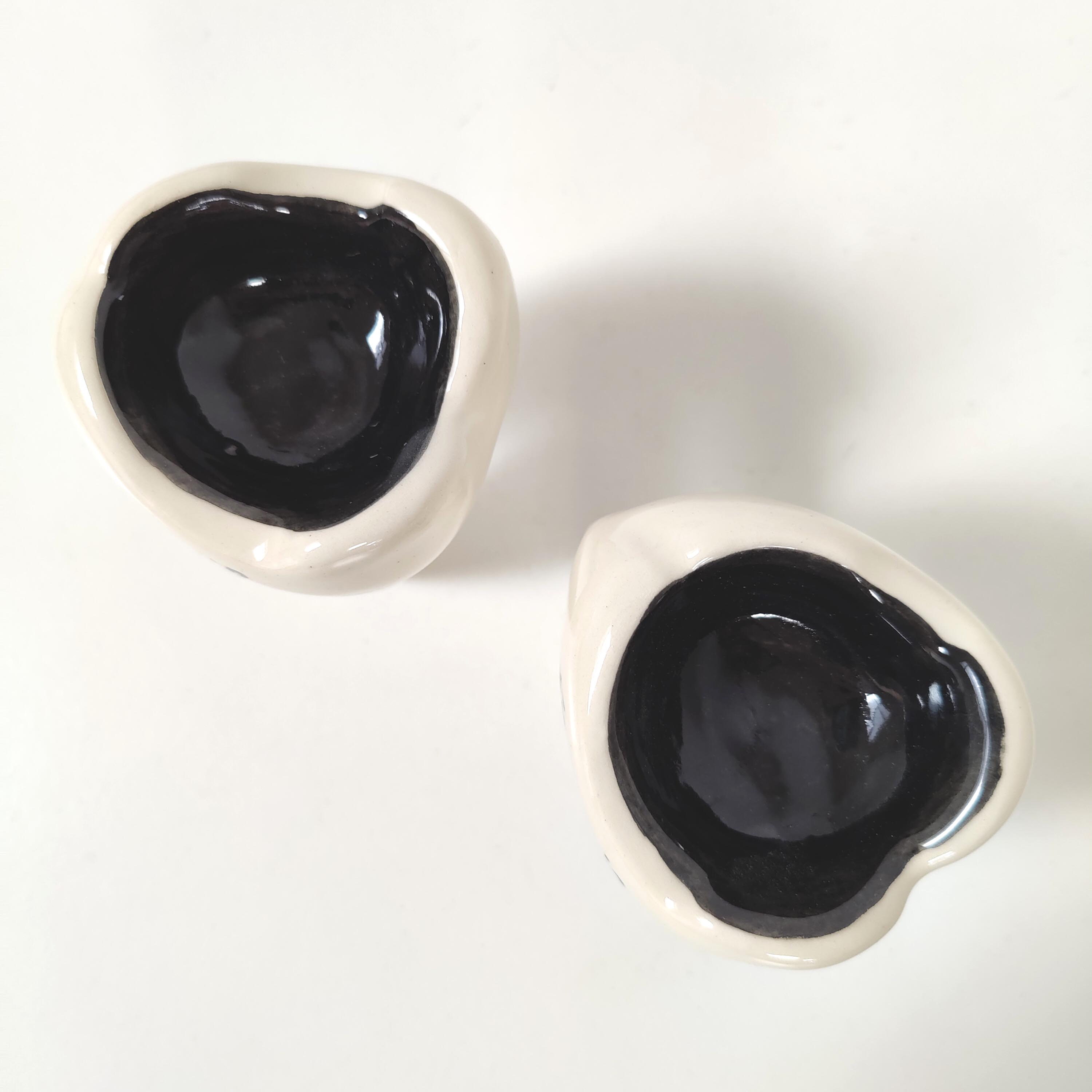 Set of two ceramic Fluocaril advertising ashtrays