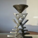 Ethnic “skeleton” candle holder in nickel-plated brass from the 80s