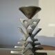 Ethnic “skeleton” candle holder in nickel-plated brass from the 80s
