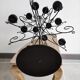 Black metal candlestick for 12 candles