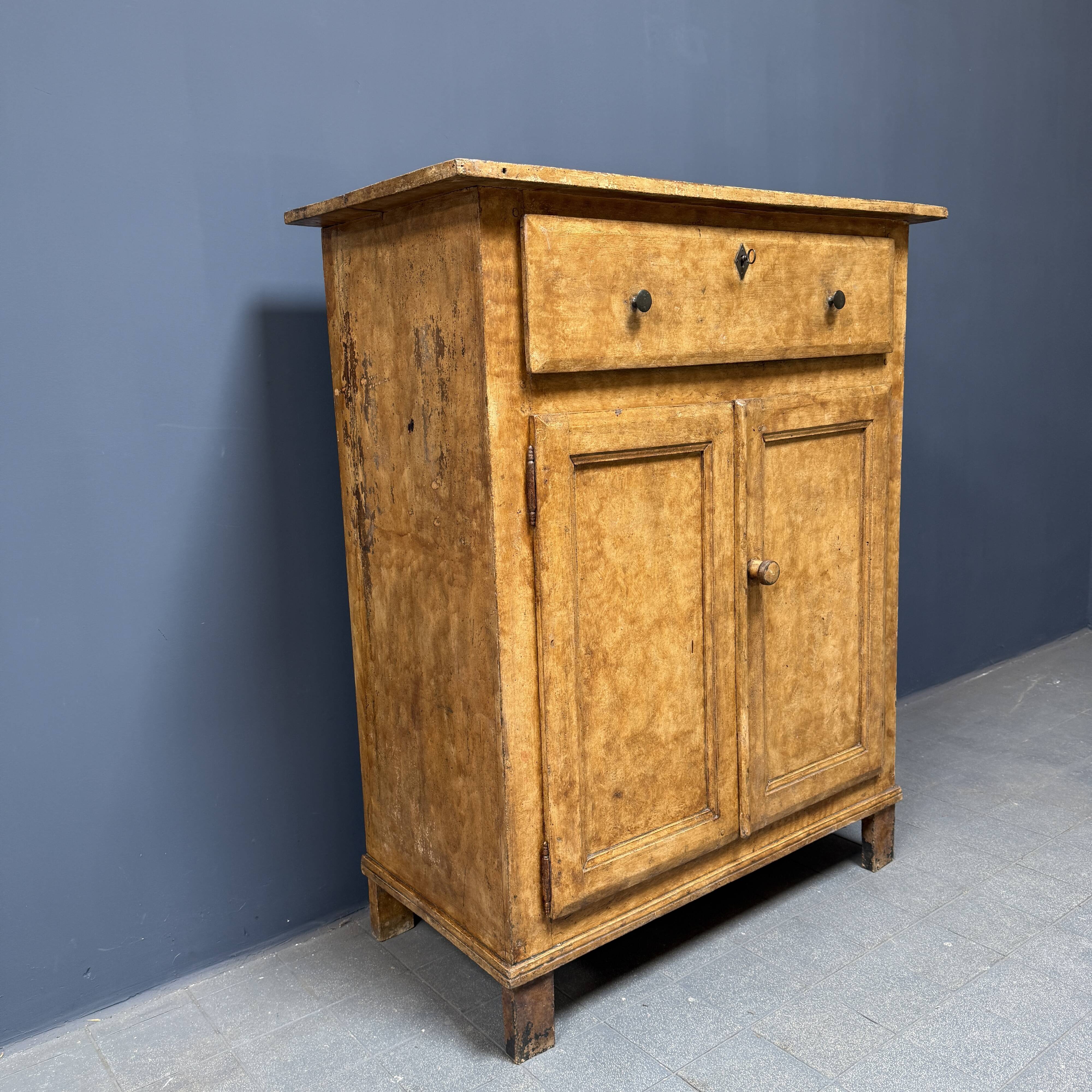 Old marbled ochre yellow French farmhouse cabinet