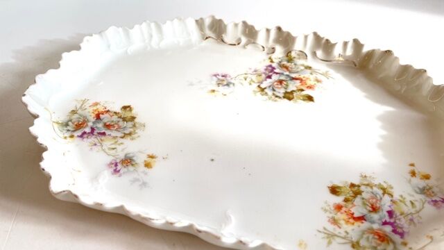 Old tray in floral pattern biscuit