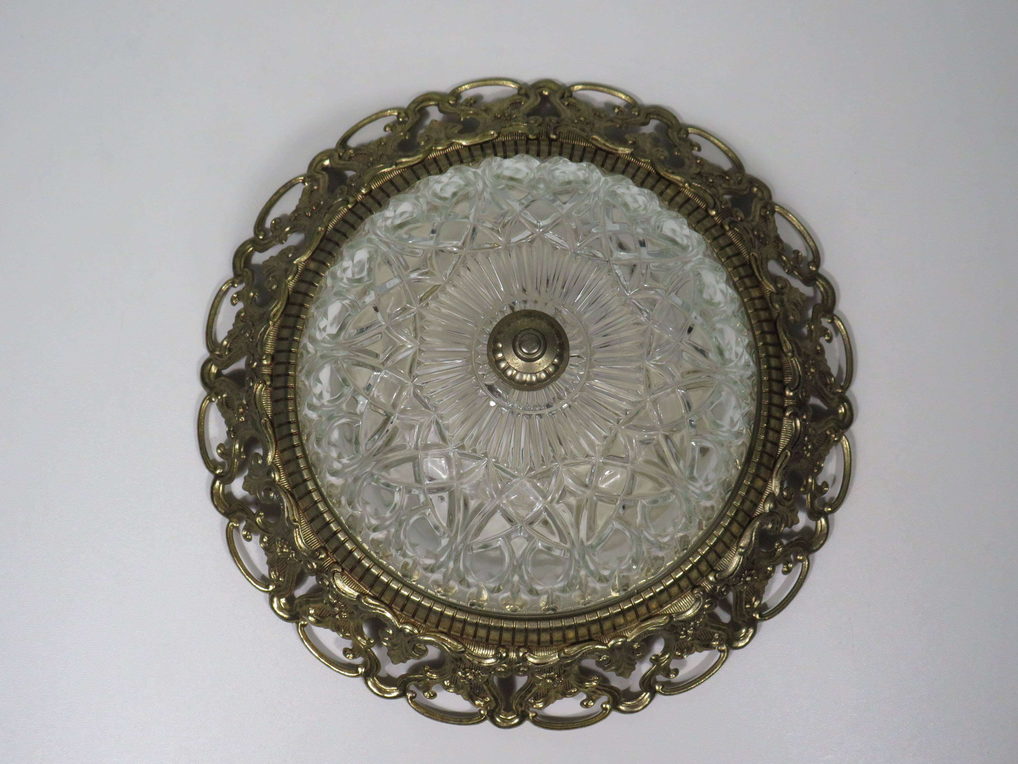 Hollywood Regency ceiling light, cut glass and openwork gold edge.