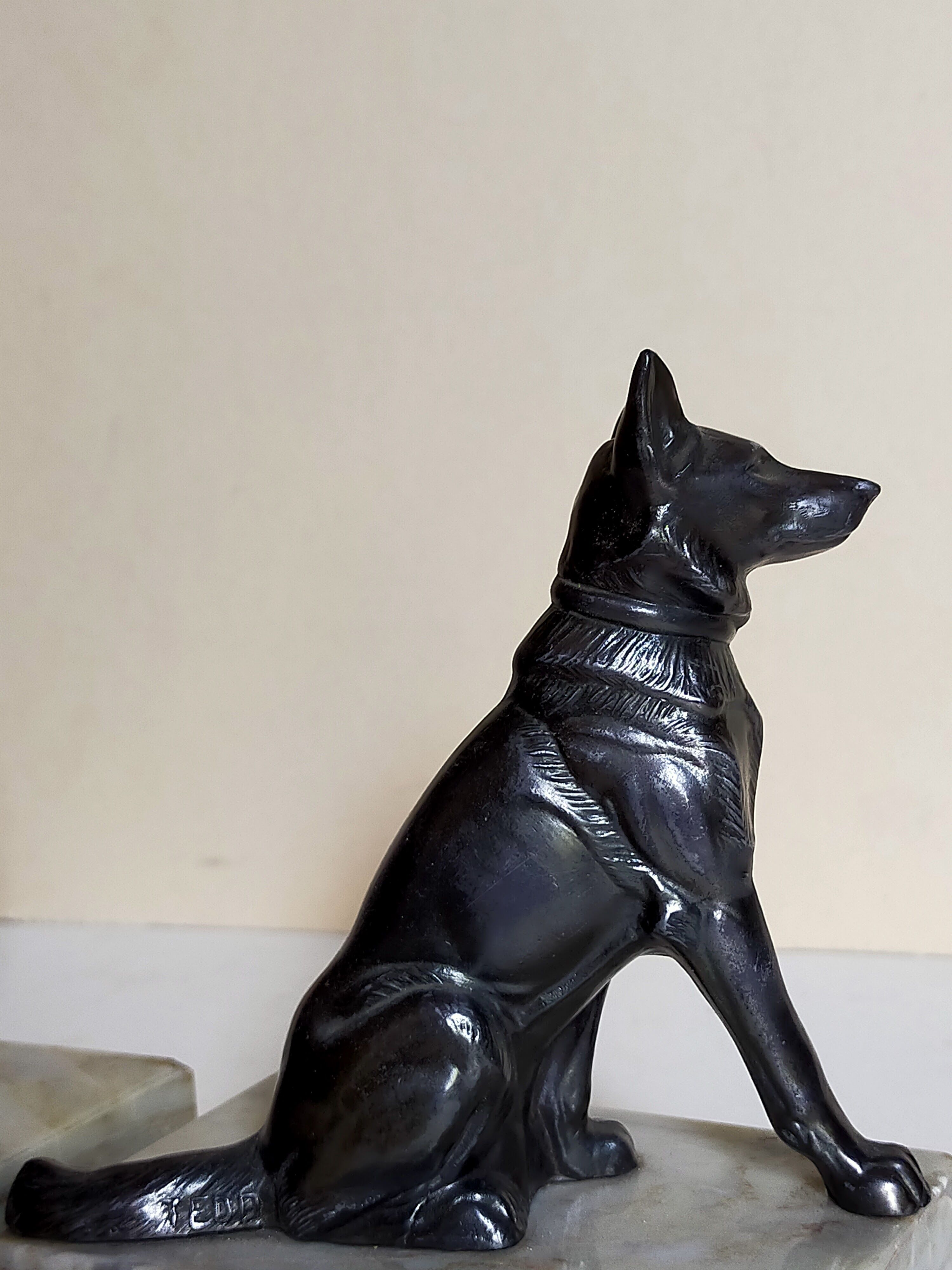 Pair of Art Deco bookends to signed wolf dogs
