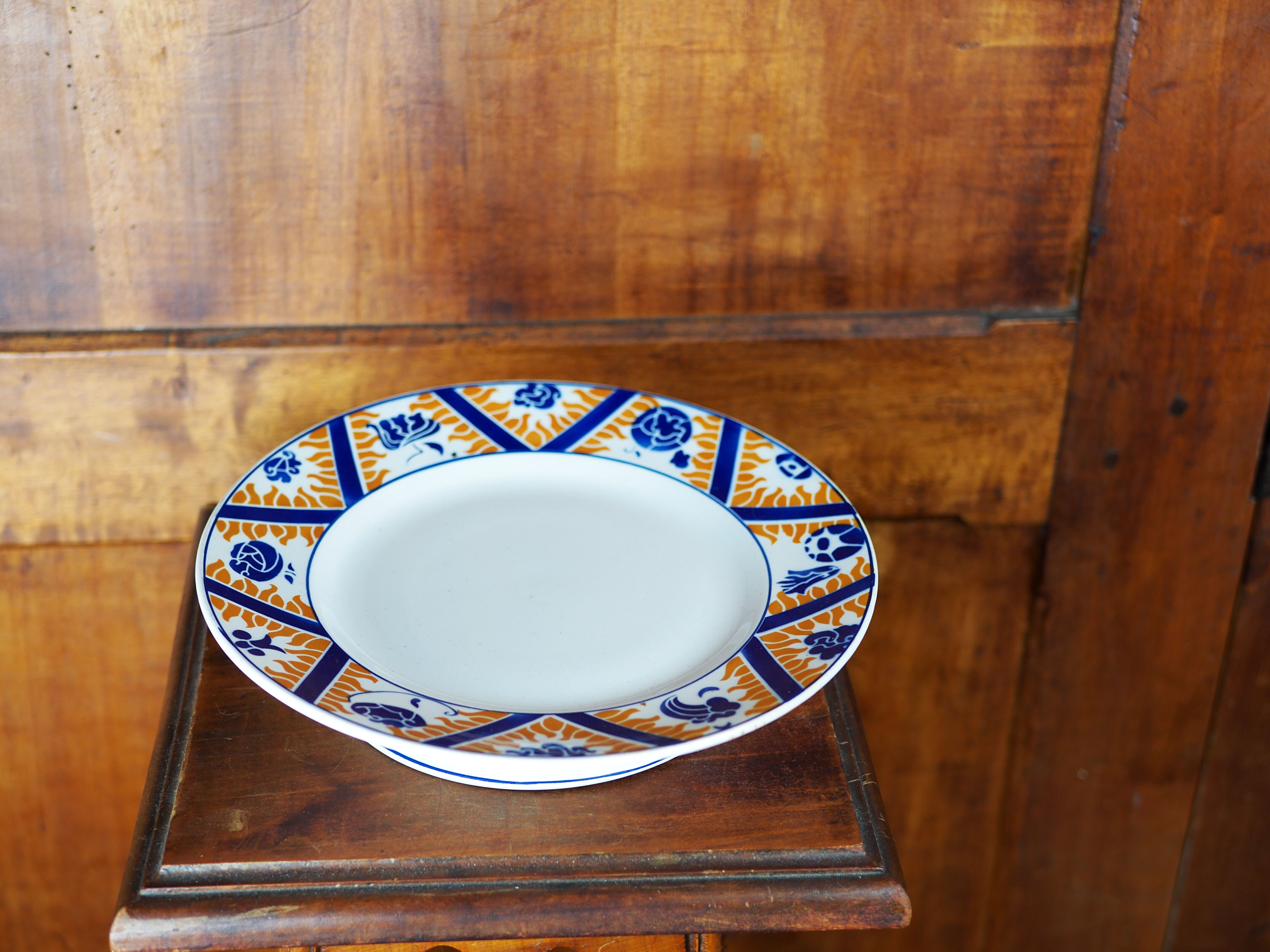 Earthenware cake dish patterned with flowers, clouds and flames, orange and blue - Orchies - 50s