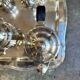 Ercuis 5-piece tea and coffee service in silver-plated metal.